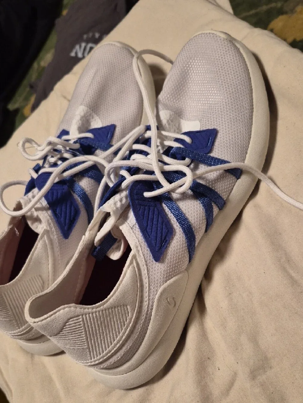 OluKai White Sneakers with Blue Webbing Accents
